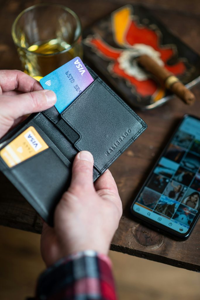 Opening a wallet with a Visa card for refer a friend program.